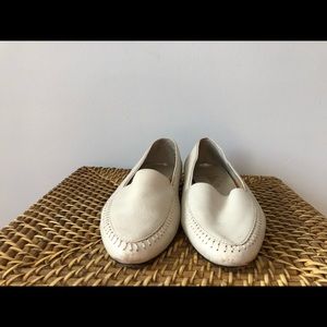 White leather loafers